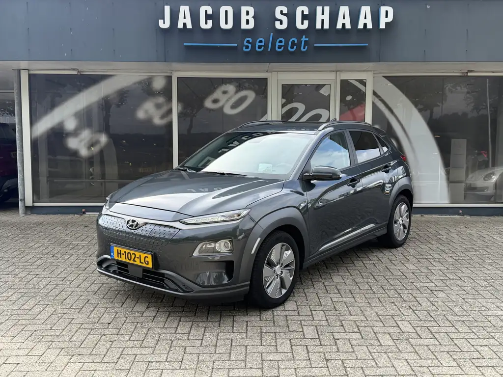 Hyundai KONA EV Premium 64 kWh / Warmtepomp / Keyless / Stoelve