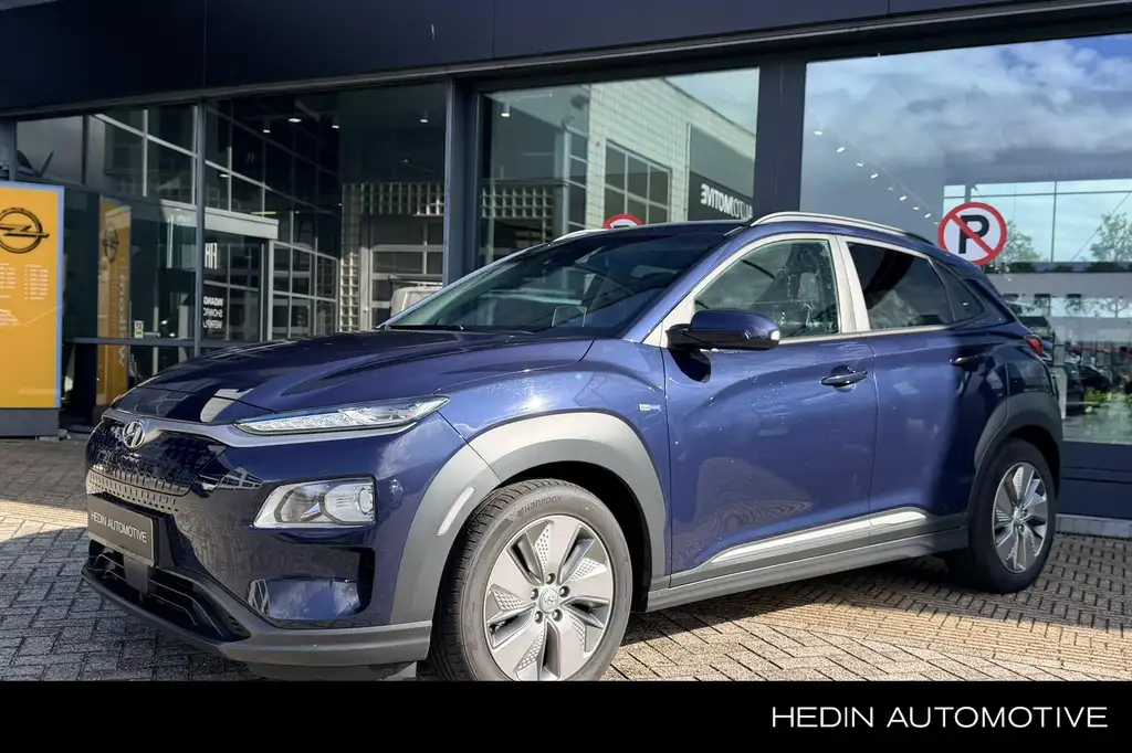 Hyundai KONA EV Fashion 64 kWh | SOH 94,8% | Trekhaak | Navigat