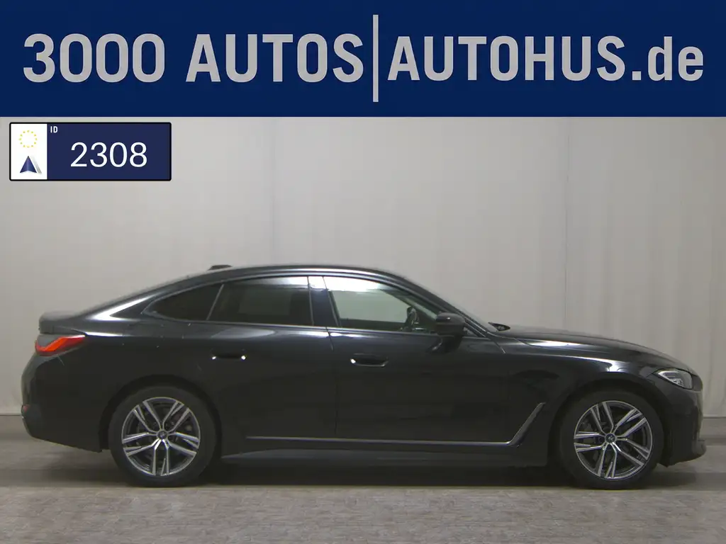 BMW i4 Gran Coupé eDrive40 Leder Navi LED Curved SPORTSITZE KLIMAAUT RADIO MFL PANO SHZ GSD PDC AHK DAB KAMERA