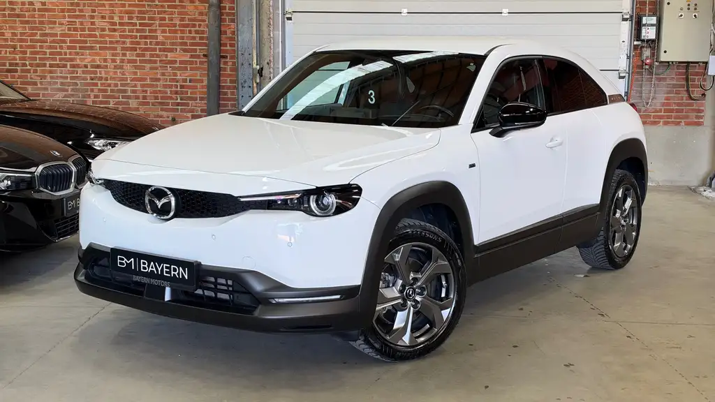 Mazda MX-30 *Garantie*Automaat*Elektrisch*SOH 95%*LED*Carplay*Navigatie*Getinte Ruiten*Camera**Zetelverwarming*Half Leder